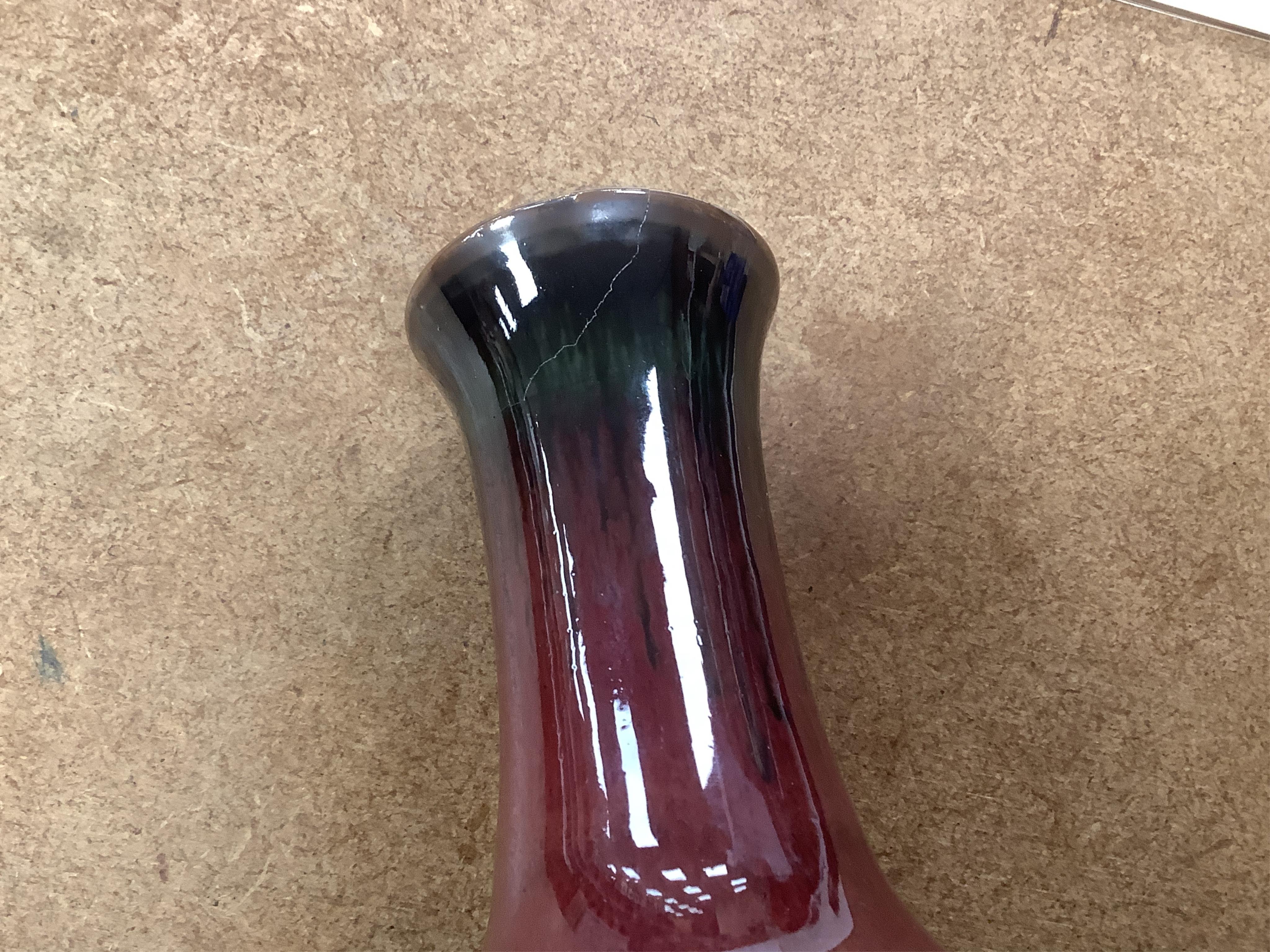 A Chinese Sang de boeuf vase, 17cm high